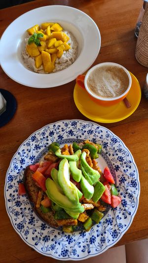 Scrambled tempeh + Avocado and coconut oatmeal at Simple Things in Kampot