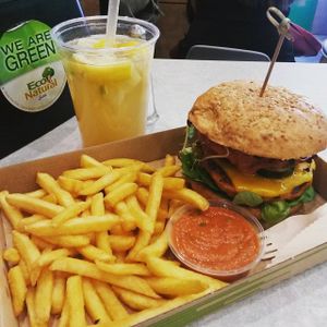 Vegan sweet potato burger with fries, lemonade and basil tomato sauce.  at Vegan Love in Budapest