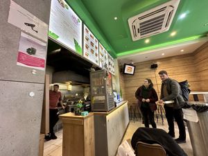 Order from the menu above the counter using the touch screen   at Vegan Love in Budapest