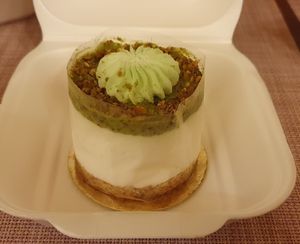Takeaway pistachio cheesecake at Vegan Love in Budapest