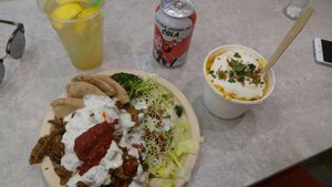 Gyros platter, lemonade, coke, mac'n'cheese with vegan bacon at Vegan Love in Budapest