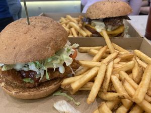 “chicken” burger with the big kahuna in the background  at Vegan Love in Budapest
