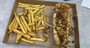 Beyond meat hot dog and French fries at Vegan Love in Budapest