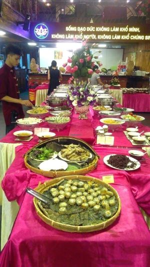4 tables stacked up with vegan food; heaven! at An Lac Chay - Hoan Kiem in Hanoi