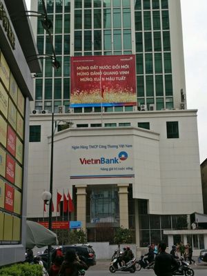 The restaurant is down the alley directly across the street from this bank at An Lac Chay - Hoan Kiem in Hanoi