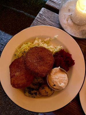 Large plates are large! My hubby had already eaten the first schnitzel    at Apteka in Pittsburgh