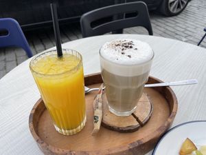 Orange juice & latte with soy milkk  at Desayuneria in Conil De La Frontera
