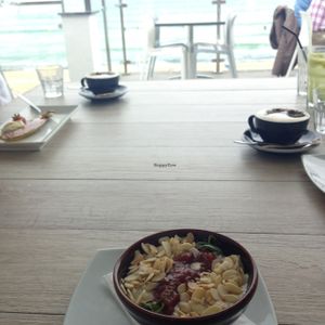 Dessert in an alcove (rice almond milk pudding with rhubarb compote and mint) at Porthmeor Beach Cafe in St Ives