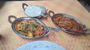 Veg something, rajma masala, and white rice at Ristorante India in Pisa