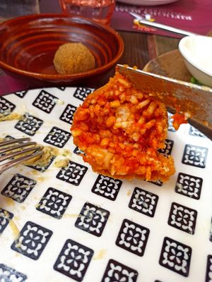 Supplì pomodoro e mozzarella vegana at Rifugio Romano in Rome