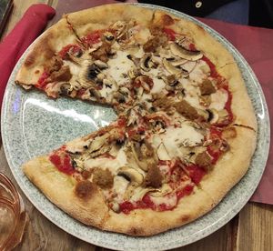 Pizza boscaiola vegan at Rifugio Romano in Rome