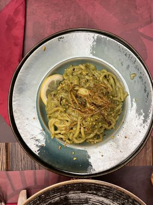 Tonnarelli acqua e farina con carciofi,limone e granella di pistacchio veg  at Rifugio Romano in Rome