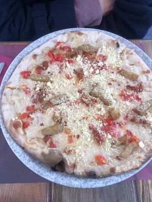 Bomba vegan (4 vegan cheeses, chilli, seitan, tomato) at Rifugio Romano in Rome