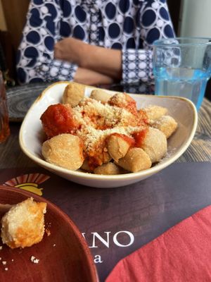 GNOCCHETTI DI PIZZA ALL'ARRABBIATA CON PARMIGIANO vegano  at Rifugio Romano in Rome