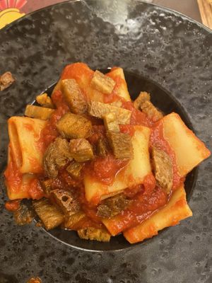 Pasta with smoked seitan, tomato sauce, chilli (opted for no vegan cheese)   at Rifugio Romano in Rome