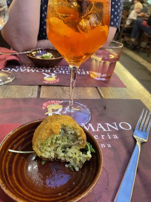 Vegan arancini. A must try!  at Rifugio Romano in Rome