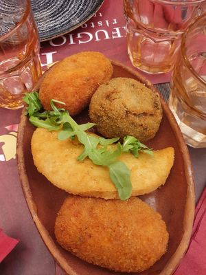 Fried arancini, suppli and sofficino at Rifugio Romano in Rome