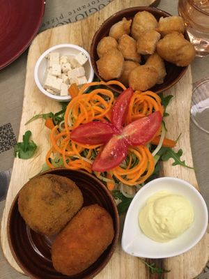 Sharing platter with arancini and tofu feta  at Rifugio Romano in Rome