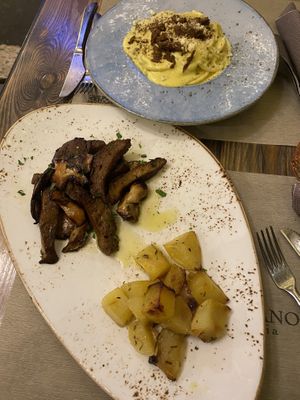 tagliata de seitan and spaghetti carbonara  at Rifugio Romano in Rome