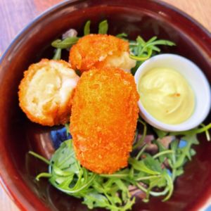 Crocchette with potatoes, vegan mozzarella and vegan mayo at Rifugio Romano in Rome