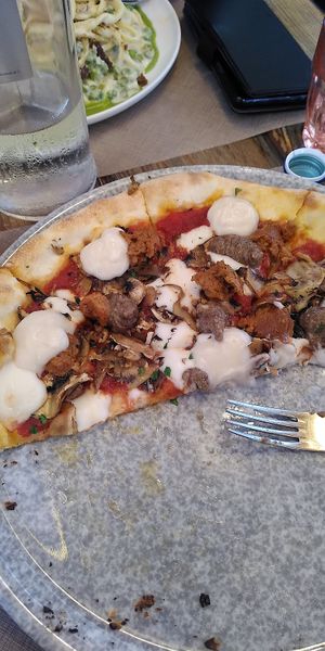 Ate half the pizza before I remembered to take a photo - so delicious. at Rifugio Romano in Rome