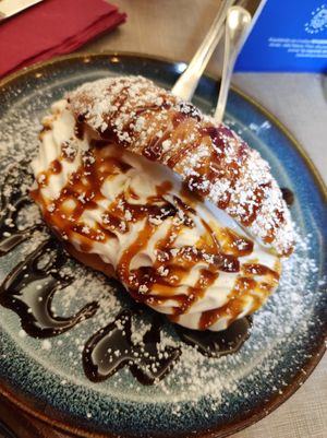 Maritozzo con Panna e Crema al Caramello at Rifugio Romano in Rome