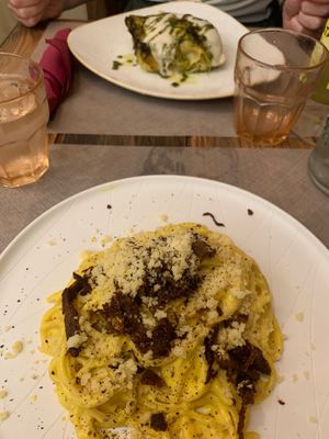 Carbonara (near) and lasagne (far)  at Rifugio Romano in Rome
