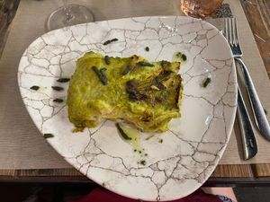 Lasagna zucchine e fiori di zucca al profumo di mare at Rifugio Romano in Rome