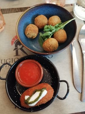 Olive all'ascolana, supplì, carbonara, tiramisù at Rifugio Romano in Rome