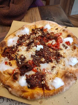 Pizza with seitan at Rifugio Romano in Rome