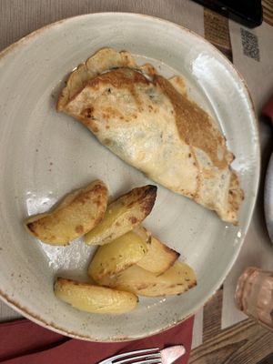 Pfannkuchen mit Spinatfüllung  at Rifugio Romano in Rome