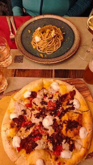 Pasta courgette pesto and pizza Bomba at Rifugio Romano in Rome