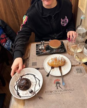 The rocher gianduia al cuore de albicocca, a dessert we can’t remember the name (help!), and the tiramisu   at Rifugio Romano in Rome
