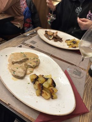 Seitan with lemon sauce and seitan with mushrooms, both with baked potatoes   at Rifugio Romano in Rome