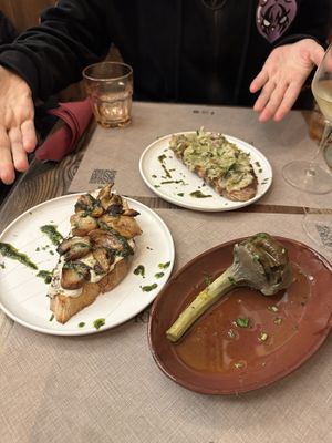 Bruschettone gorgonzola with funghi porcini, artichoke al olio and bruschetone with artichoke creamm  at Rifugio Romano in Rome