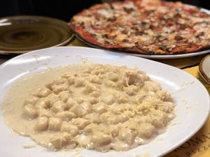 Four cheese gnocchi and pizza at Rifugio Romano in Rome