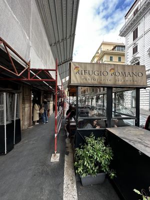 Outdoor seating   at Rifugio Romano in Rome