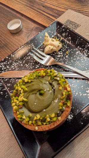 Pistachio and raspberry tartlet at Rifugio Romano in Rome