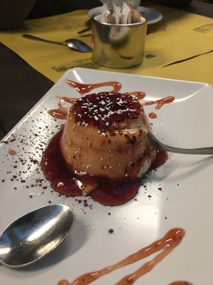 Vegan panda cotta with stawberry sauce at Rifugio Romano in Rome