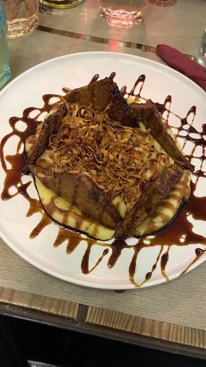 Soy marinated tempeh with fig absolute essence, potato purée and carrots chips.  at Rifugio Romano in Rome