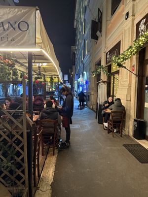 Outdoor seats  at Rifugio Romano in Rome