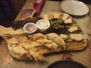 Tagliere formaggi a base di anacardi at Rifugio Romano in Rome