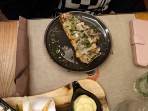 Bruschettone al carciofo alla romana con primosale di anacardi riduzione di menta at Rifugio Romano in Rome