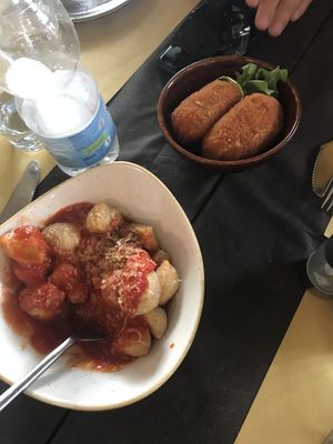 Vegan pizza balls and rice croquettes. Delicious  at Rifugio Romano in Rome