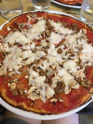 Sooo good, Pizza with crumbled Seiten and mushrooms  at Rifugio Romano in Rome