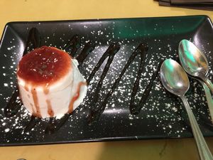 Delicious Vegan Pan-a Cot-a with strawberry sauce  at Rifugio Romano in Rome