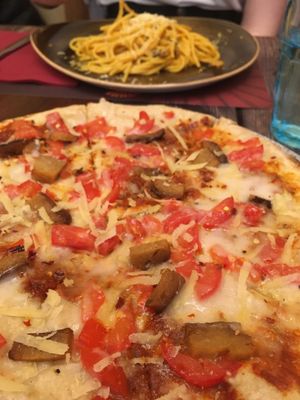 Bomba pizza & vegan carbonara  at Rifugio Romano in Rome
