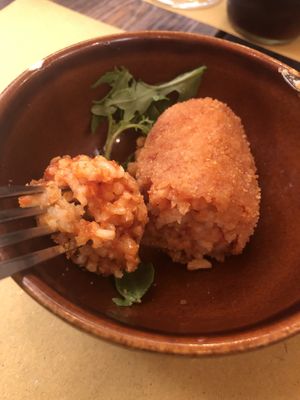 Rice balls with tomato sauce and cheese at Rifugio Romano in Rome