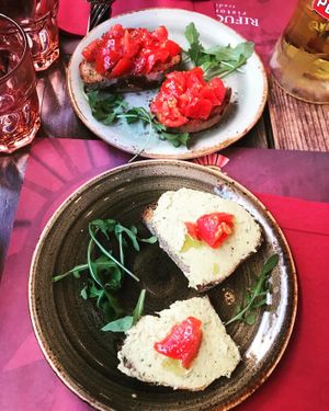 Bruschetta hummus e pachino and bruschetta al pomodoro  at Rifugio Romano in Rome