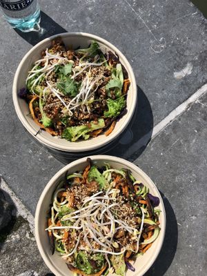 The bowl of the week , noodles with tempeh , zoodles, broccoli, sweet potato ,…. at PLUS in Ghent